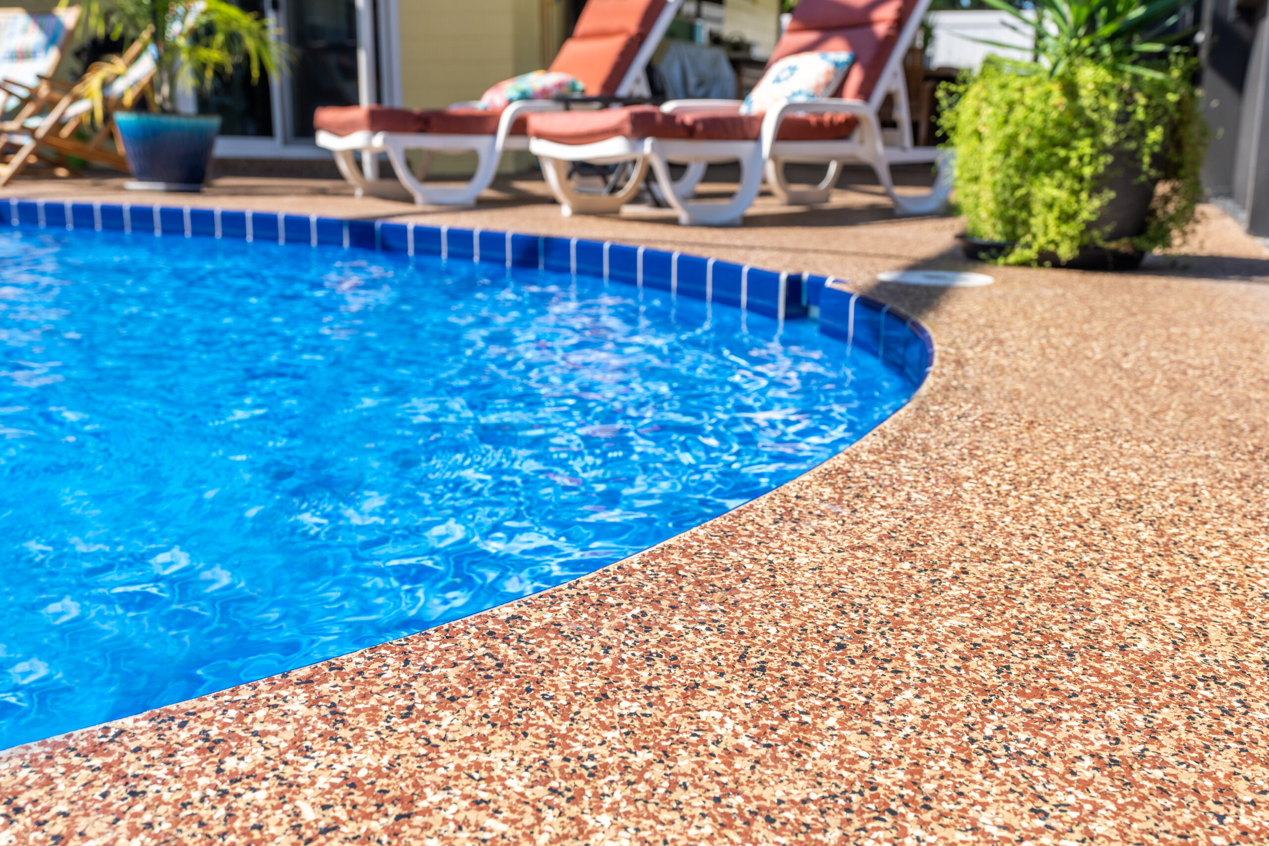 Slip-resistant pool deck coating